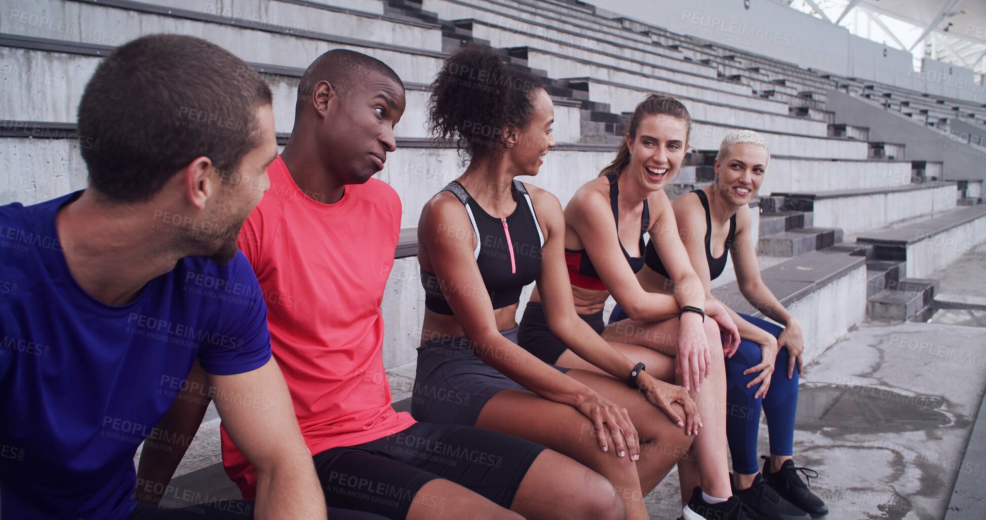Buy stock photo Conversation, break and fitness with people on stadium bleachers for bonding or sports training. Exercise, recovery and rest with group of athlete friends speaking in venue for workout discussion