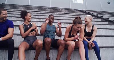 Buy stock photo Athlete, people and relax on steps at stadium for planning, fitness break and competition tips. Happy, friends and laugh with exercise discussion, training joke and race feedback of sports tournament