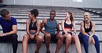 Group, people and rest on stairs at stadium for planning, fitness break and competition advice. Athlete, friends and relax for exercise discussion, training tips and race feedback of sports challenge