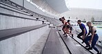 Athlete, group and running on stairs with fitness for competition exercise, endurance or diversity. Teamwork, people and training on steps at arena for sports performance, cardio routine and stamina