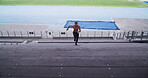 Athlete, man and stair running at stadium for competition fitness, endurance training and practice. Above, runner and sprint on steps at arena for sports performance, intense workout and race warm up