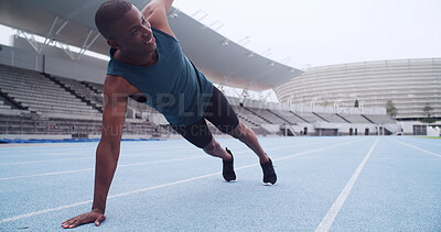 Buy stock photo Black man, athlete and stretching at stadium for sports competition, running or fitness. Training, balance and person outdoor as track runner, marathon warm up and space for workout and wellness
