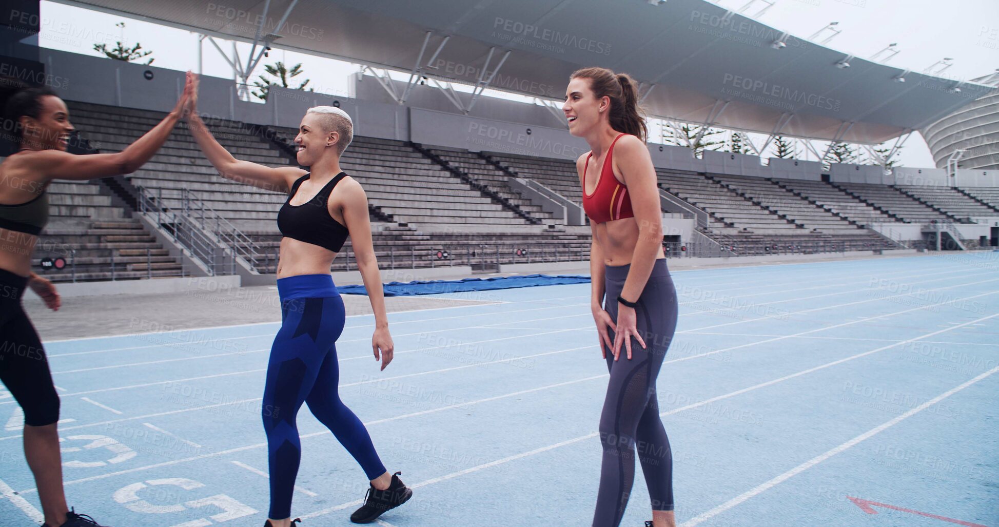 Buy stock photo Exercise, women and team with high five in stadium for workout, marathon race or running. Athletes, celebration and outdoor challenge for fitness goals, teamwork or support for cardio achievement