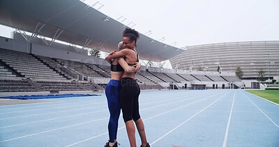 Buy stock photo Exercise, women and celebration with hug in stadium for workout, marathon race or running. Athlete friends, smile and outdoor challenge for fitness goals, teamwork or support for cardio achievement