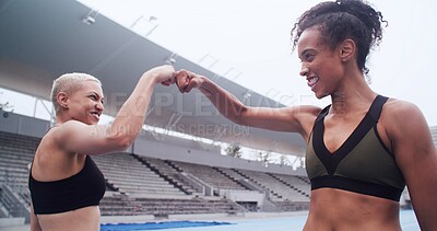 Buy stock photo Exercise, women and celebration with fist bump in stadium for workout, marathon race or running. Friends, smile and outdoor challenge for fitness goals, teamwork or support for cardio achievement