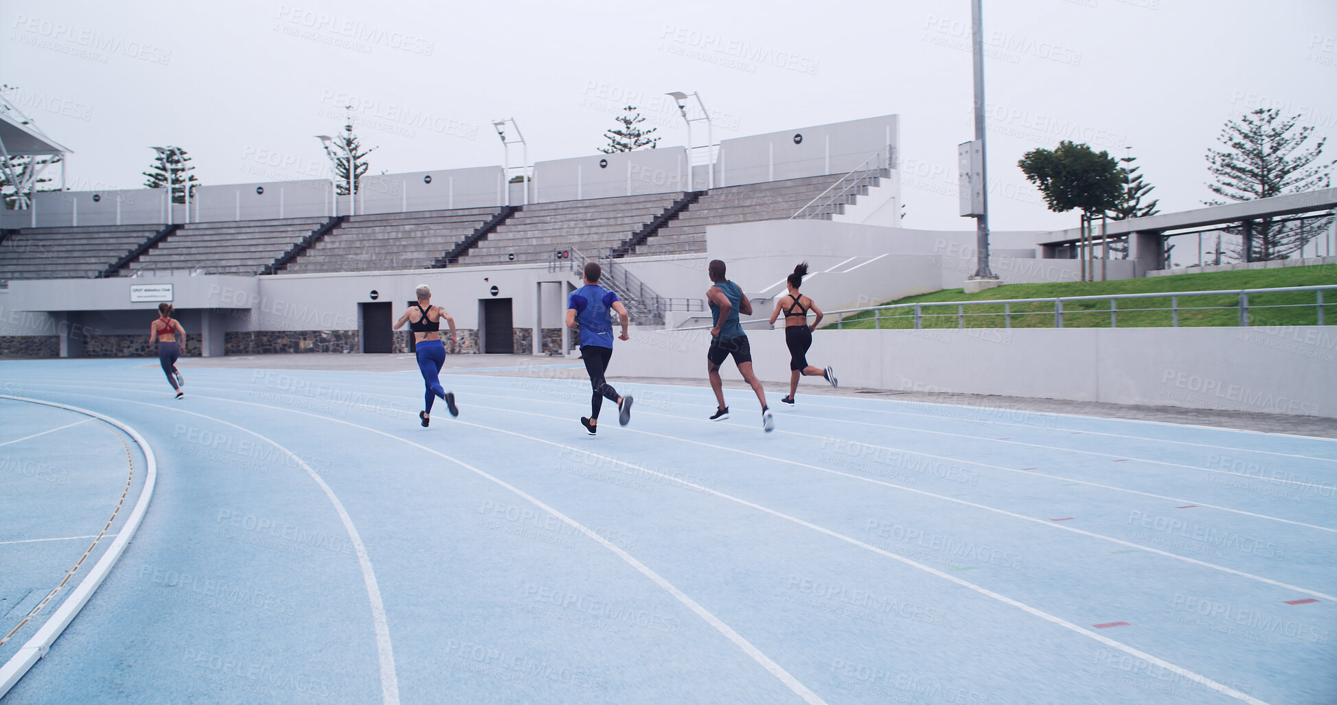 Buy stock photo Running, competition and workout with people on race track for fitness, challenge and marathon. Exercise, health and sports athlete with back of runner in stadium for training, sprint and cardio