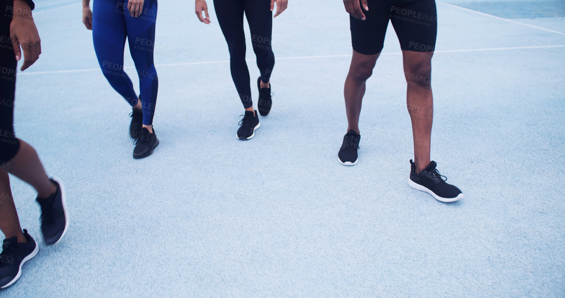 Buy stock photo Runner, walking and workout with legs on race track for marathon practice, fitness and cardio challenge. Sports athlete, exercise and competition with people in stadium for health, training and space