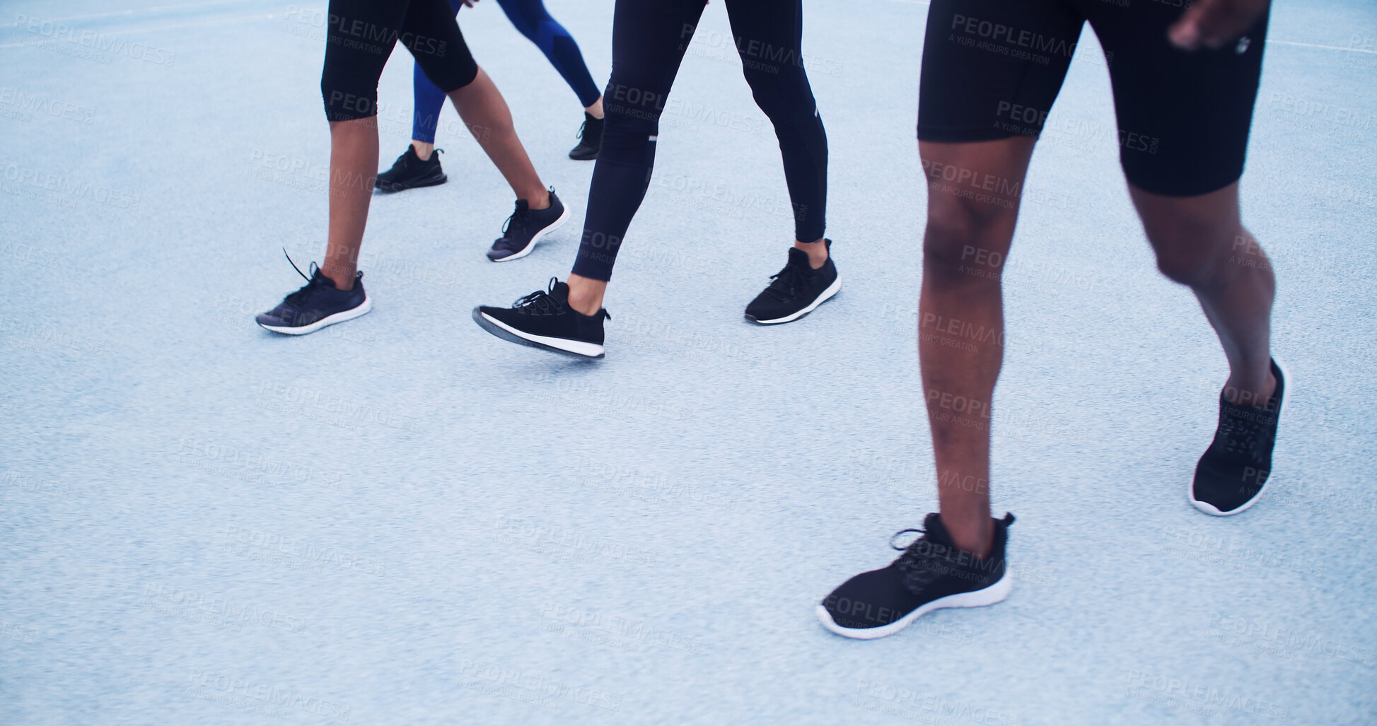 Buy stock photo Active, people and running on road, legs or training for marathon together, race or workout routine. Athlete, feet and group with footwear for cardio, exercise and preparing for sport competition