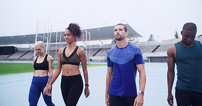 Buy stock photo Group, athlete and people walk at stadium of fitness, start exercise and training for race. Team, runners and getting ready for endurance workout, marathon practice and sports activity of competition