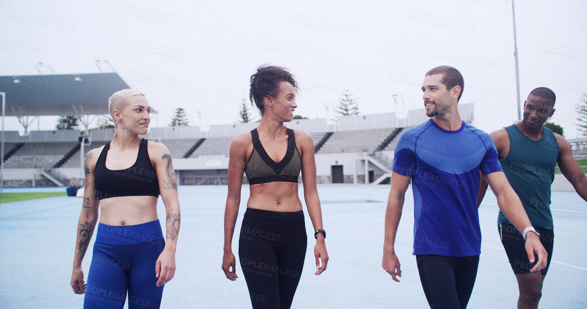 Buy stock photo Smile, athlete and people walk at stadium of fitness, start exercise and training for race. Team, runners and getting ready for endurance workout, marathon practice and sports activity of competition