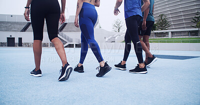 Buy stock photo Feet, athlete and people walk at stadium for fitness, start exercise and training for race. Legs, runners and getting ready for endurance workout, marathon practice and sports activity of competition