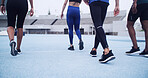 Legs, athlete and people walking at stadium of fitness, start exercise and training for race. Feet, runners and getting ready for endurance workout, marathon practice and sports activity of challenge