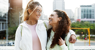 Buy stock photo Students, friends and women in city hug outdoor for education, learning and commute to college. Happy, university and people embrace in town for studying, future career and opportunity on campus
