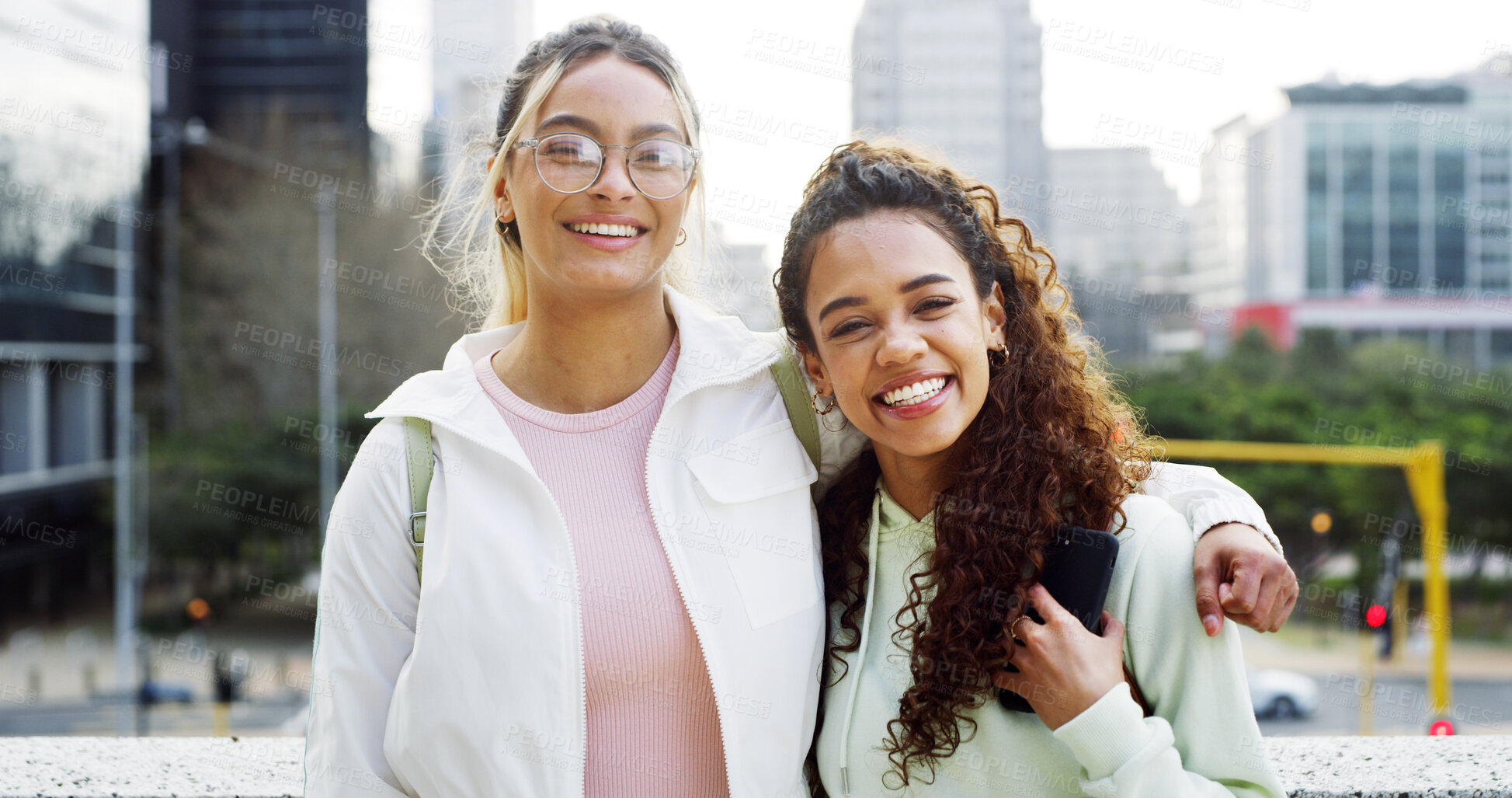 Buy stock photo College students, friends and happy women hug outdoor for education, scholarship and laugh. Portrait, university campus and girls embrace in city together with gen z for support, funny and bonding