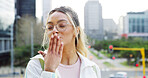 Confident, woman and blow kiss as student in city for education, urban learning and flirty pose. Love, expression and female person for college scholarship, university opportunity and studying pride