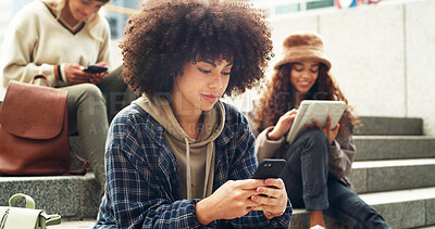Buy stock photo Stairs, online and women with smartphone, relax or update for assignment on social media at college. Steps, university students and people with mobile for message, texting and communication on campus