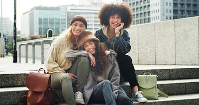 Buy stock photo Portrait, city and girl friends on stairs with fashion for trendy, cool and modern clothes on holiday. Happy, steps and female people with stylish outfit in urban town on vacation or weekend trip
