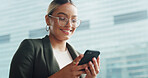 Business, smartphone and woman in city, smile and message to contact, travel and social media. Outdoor, person and employee with cellphone, commute and texting with internet connection and email
