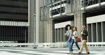 Buy stock photo Walking, employees and women with coffee, city and travel to meeting for sales, team and discussion. Commuting, colleagues and salespeople with caffeine, collaboration and conversation for project