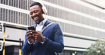 Buy stock photo Happy, black man and listening with headphones in city for music, audio streaming or phone app. Excited, businessman and mobile smartphone with smile for sound or online subscription in an urban town