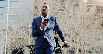 Buy stock photo Phone, thinking and businessman in city with bicycle, schedule and commute for interview. Bike, communication and African employee in urban town with search, directions and mobile for job opportunity