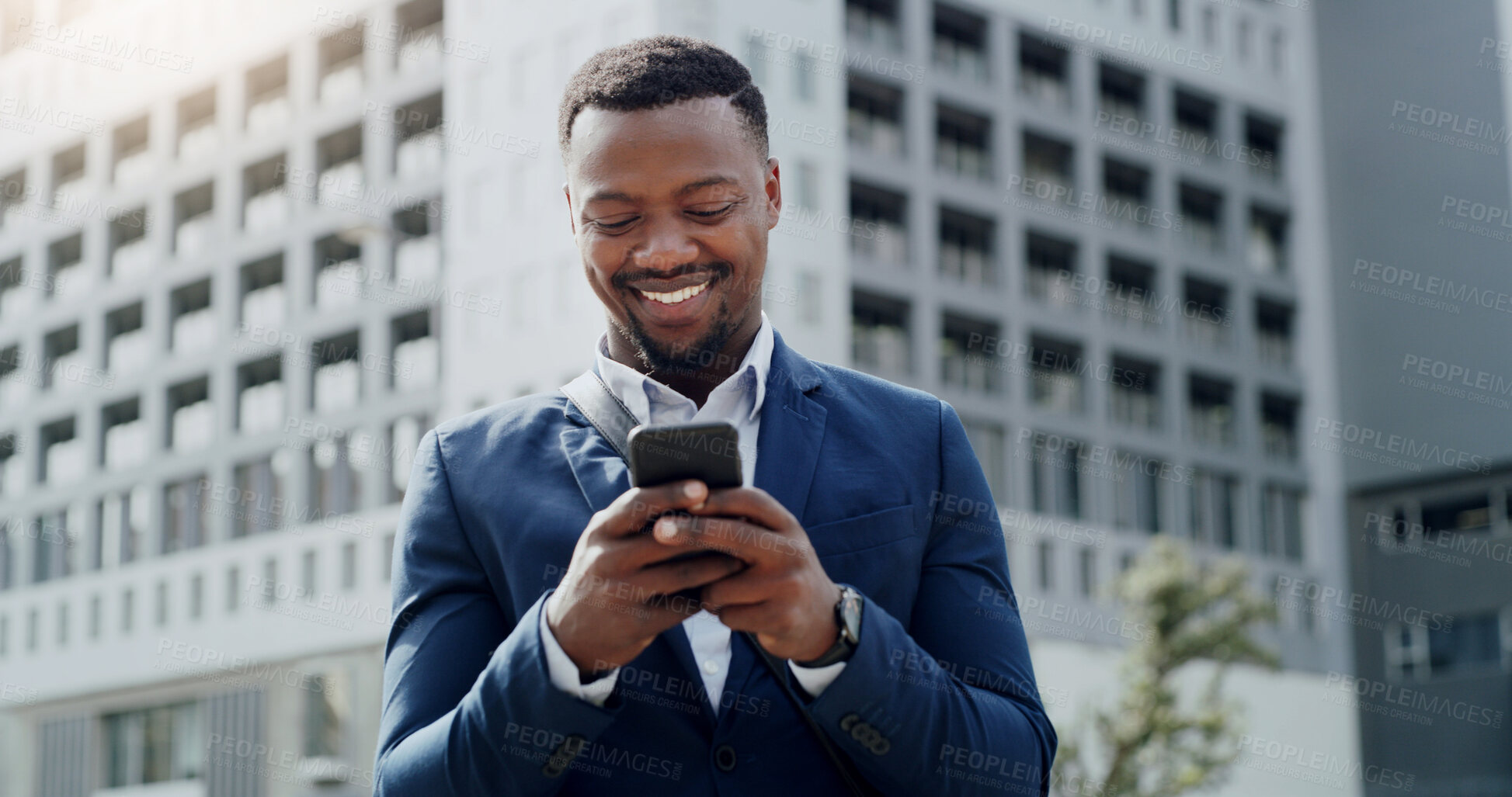 Buy stock photo Business, phone and smile of black man outdoor, reading text message for real estate feedback or update. App, city and good news with employee typing communication for commercial property development