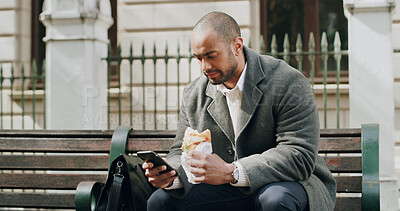 Buy stock photo Business, man and phone with food in city for travel, browsing social media and lunch break. Male person, relax and mobile with meal on bench, direction search and notification update for urban trip