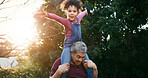 Grandpa, shoulder carry and kid in park for fun together, bonding and freedom on summer vacation. Happiness, old man and girl with piggyback, playful or game with portrait for memory and adventure