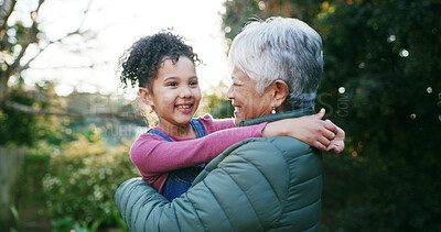 Buy stock photo Hug, grandma and happy with child, outdoor or bonding with girl in nature, love or break on weekend. Park, old woman and kid with smile, embrace and together on holiday, granddaughter and family