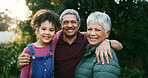 Grandparents, child and hug with portrait at park for bonding together, holiday break and connection. Family, senior people and girl kid with smile in nature for relationship, weekend visit and love