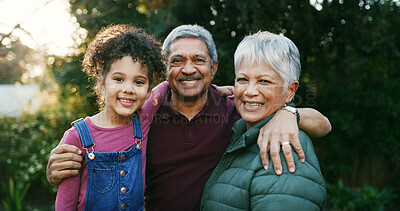 Buy stock photo Grandparents, child and hug with portrait at park for bonding together, holiday break and connection. Family, senior people and girl kid with smile in nature for relationship, weekend visit and love