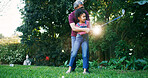 Golf, teaching and grandfather with kid in nature for swing, target practice and support together. Sports prodigy, teaching and game mentor with old man and girl in backyard of home for put and hobby