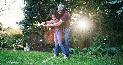 Buy stock photo Family, child and teaching golf in garden for learning, swing technique and bonding together. Helping, girl kid and grandfather playing sports in backyard with support, weekend activity and skills