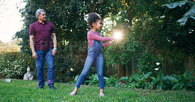 Buy stock photo Grandpa, child and playing golf outdoor for weekend activity, learning skills and teaching technique. Family, senior man and girl with sports in garden for bonding together, swing practice or support