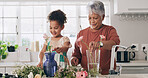 Grandmother, child and flower care in kitchen for learning botany, help and bonding with family. Grandma, girl and plants in home for healthy growth, smile or teach floral decor with vase for hobby