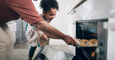 Buy stock photo Baking, oven and child with parent, home or excited for cookies, help or learning recipe in kitchen. Happy, girl and family with biscuits, growth and skill development for kid, person and dessert