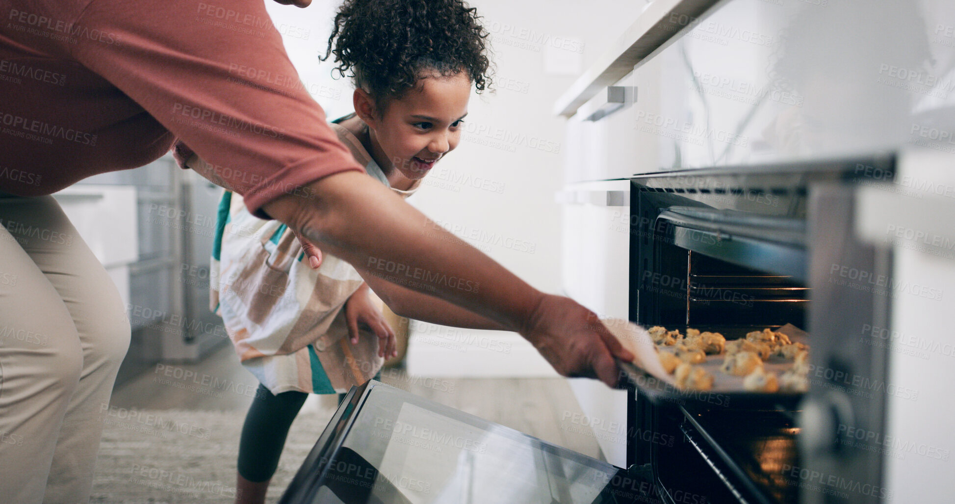 Buy stock photo Baking, oven and child with parent, home or excited for cookies, help or learning recipe in kitchen. Happy, girl and family with biscuits, growth and skill development for kid, person and dessert
