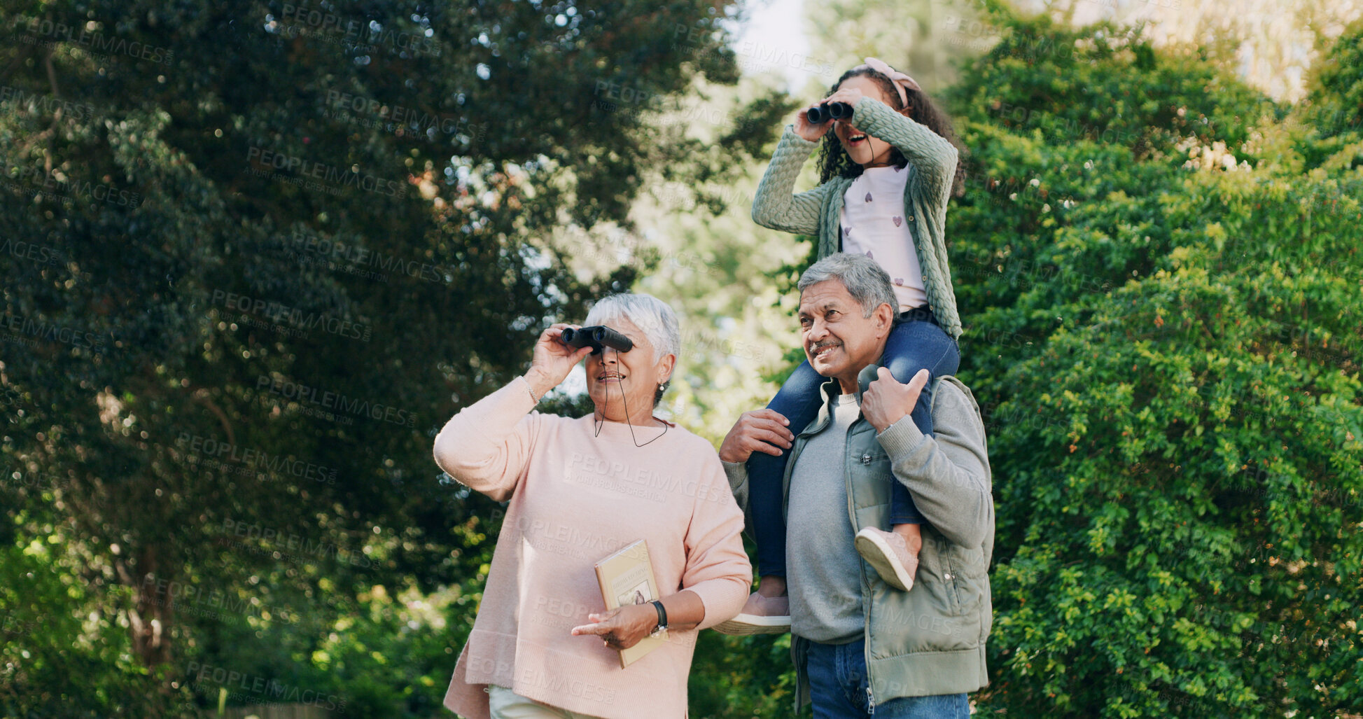 Buy stock photo Bird watching, grandparents and girl with family, countryside and  bonding together with hobby. Grandchild, old man and senior woman in forest, binocular and travel with view, sightseeing and explore