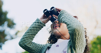 Buy stock photo Smile, child and check binocular at park for travel, bird watching and holiday sightseeing. Happy, girl and equipment for nature observation, wildlife study and scenery view for vacation discovery