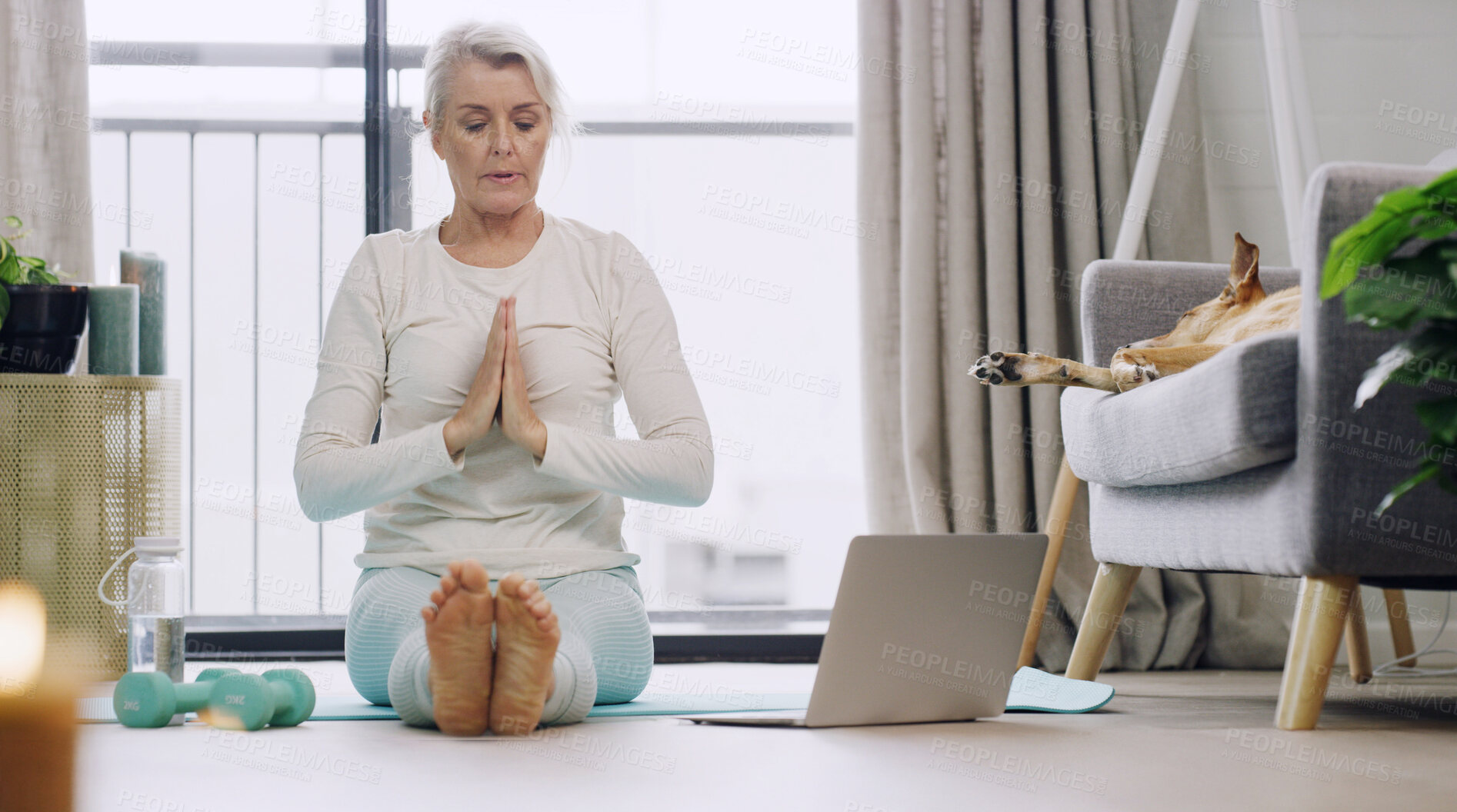 Buy stock photo Yoga, woman and laptop with meditation in home for online tutorial, health class or morning routine. Mindful, praying hands or mature person on floor with technology for pilates or holistic wellness