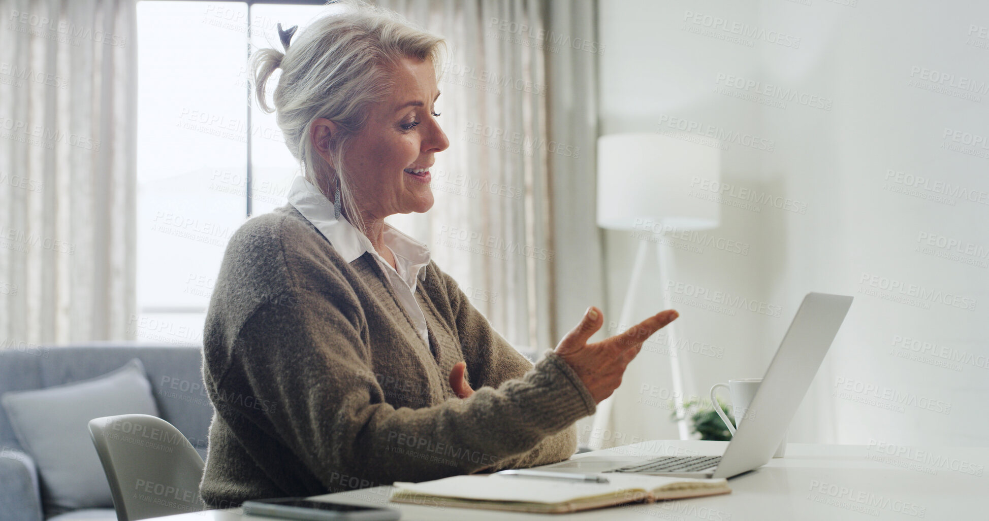 Buy stock photo Laptop, pointing and video call with woman in home office for online communication or remote work. Computer, conversation and virtual meeting with mature freelancer in apartment for discussion