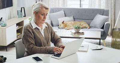 Buy stock photo Laptop, remote work and typing with woman in living room of home for notes, planning or research. Computer, report and small business with mature freelance employee at desk in apartment for agenda