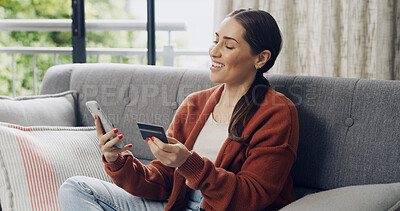 Buy stock photo Credit card, online shopping and phone with happy woman on sofa in living room of home for checkout. App, ecommerce and purchase with customer in apartment for payment, transfer and transaction