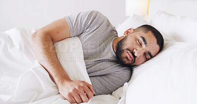 Buy stock photo Home, sleeping and man in bedroom, resting and dreaming with break, morning and blanket. Apartment, pillow and person with duvet, comfortable and mattress with soft bedding, lazy and stress relief