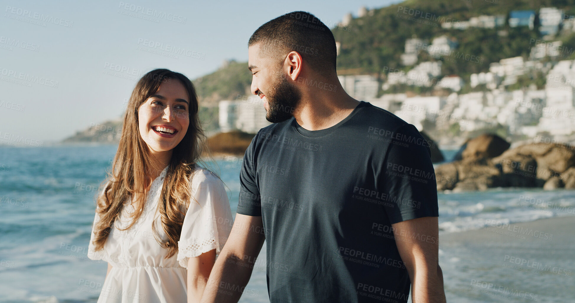 Buy stock photo Love, smile and vacation with couple at beach for travel, summer and relax. Adventure, support and holiday trip with walking, man and woman on seaside date for commitment, care and happy together