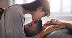 Couple, love and affection with kiss for comfort, intimacy or trust with commitment in home. Man, woman or lovers with touch, romance or passion for sensual relaxation, support or bonding in house