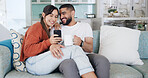 Coffee, phone and relax with couple on sofa in living room of home together for social media browsing. App, communication or beverage with man and woman laughing in apartment for bonding or wellness