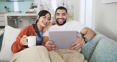 Buy stock photo Tablet, smile and couple in home for streaming, video and bonding on living room sofa. Coffee break, technology and happy man with woman, website and social media or internet browsing for film