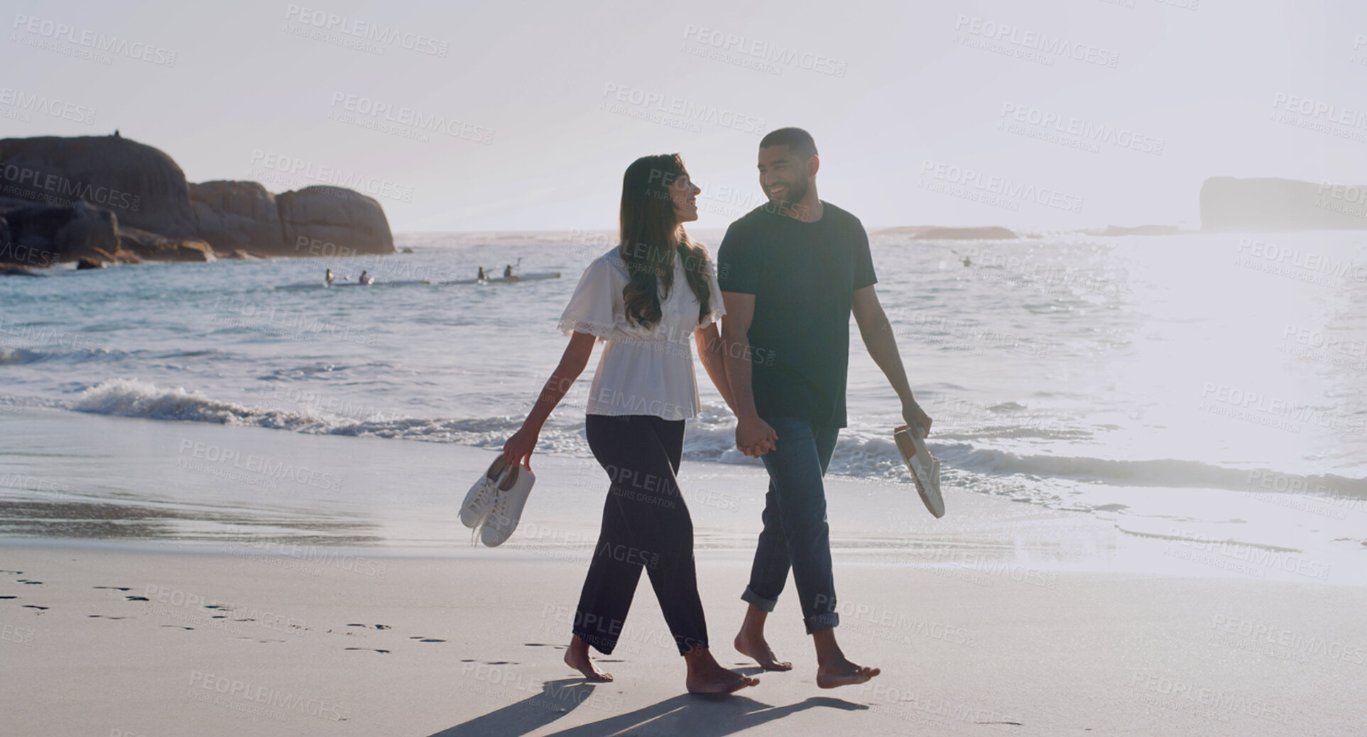 Buy stock photo Love, holding hands and vacation with couple at beach for travel, summer and relax. Adventure, support and holiday with walking, man and woman on seaside date for commitment, care and happy together