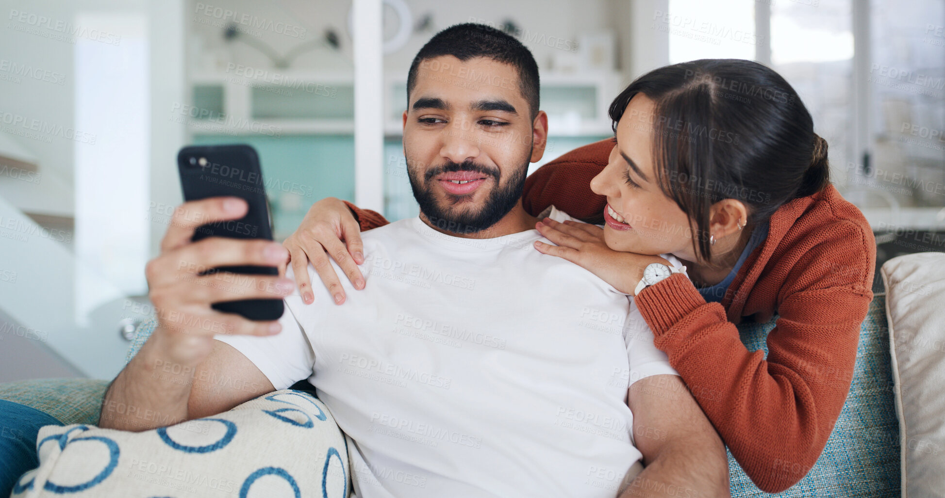Buy stock photo Smile, couple and selfie in living room for love, care or post on social media for relationship. Photo, man and woman in home with profile picture, relax and embrace partner for memory together